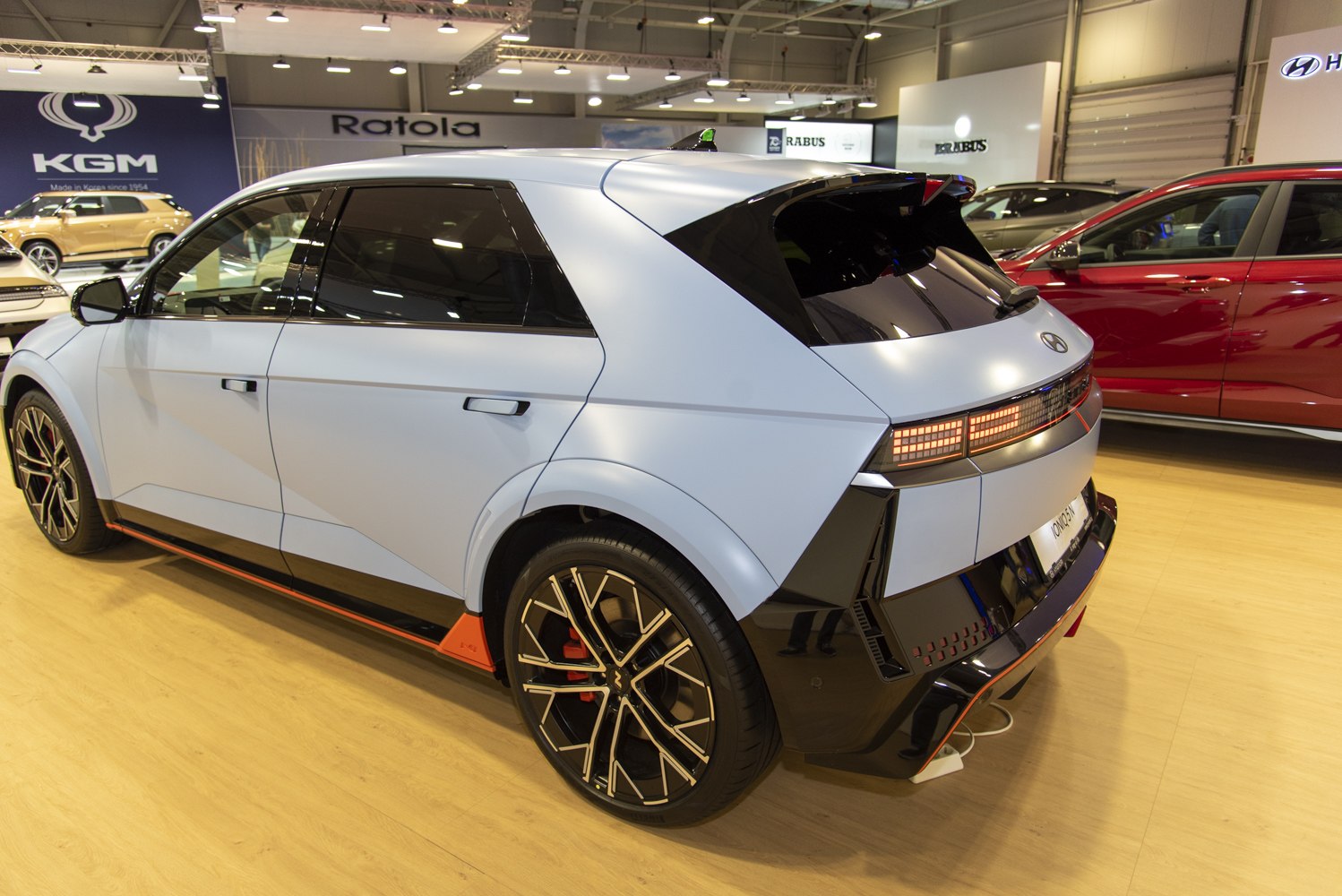 Rear side view with pixelated taillights and multi-spoke alloy wheels