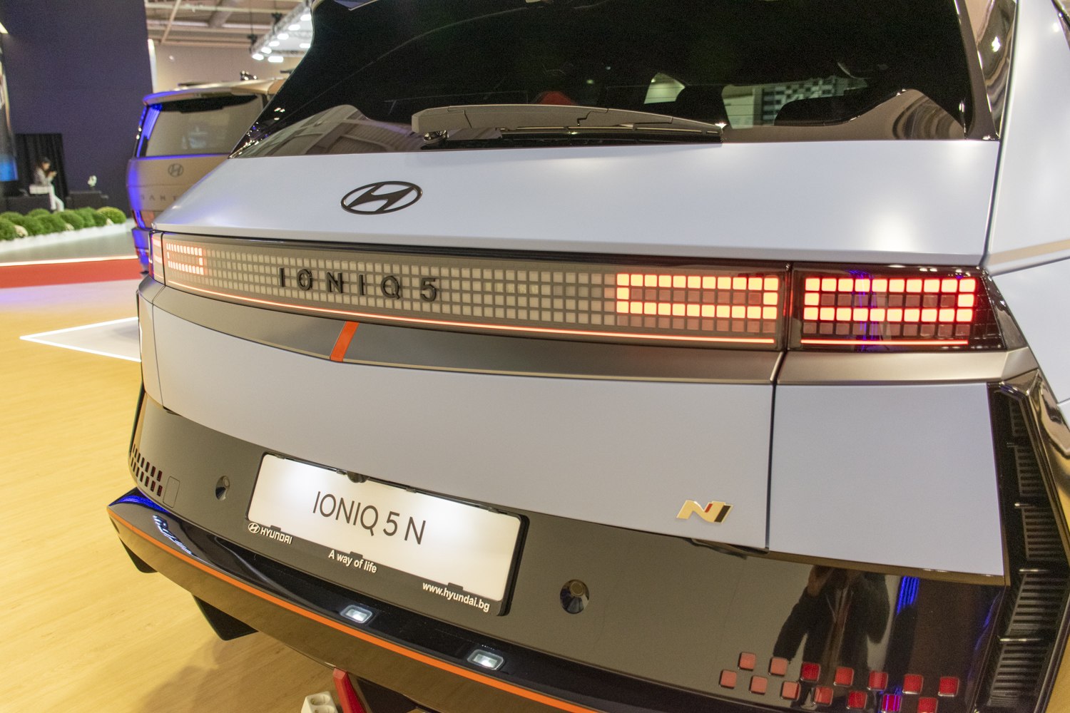 Rear pixel LED tail lights and N badge on vehicle rear