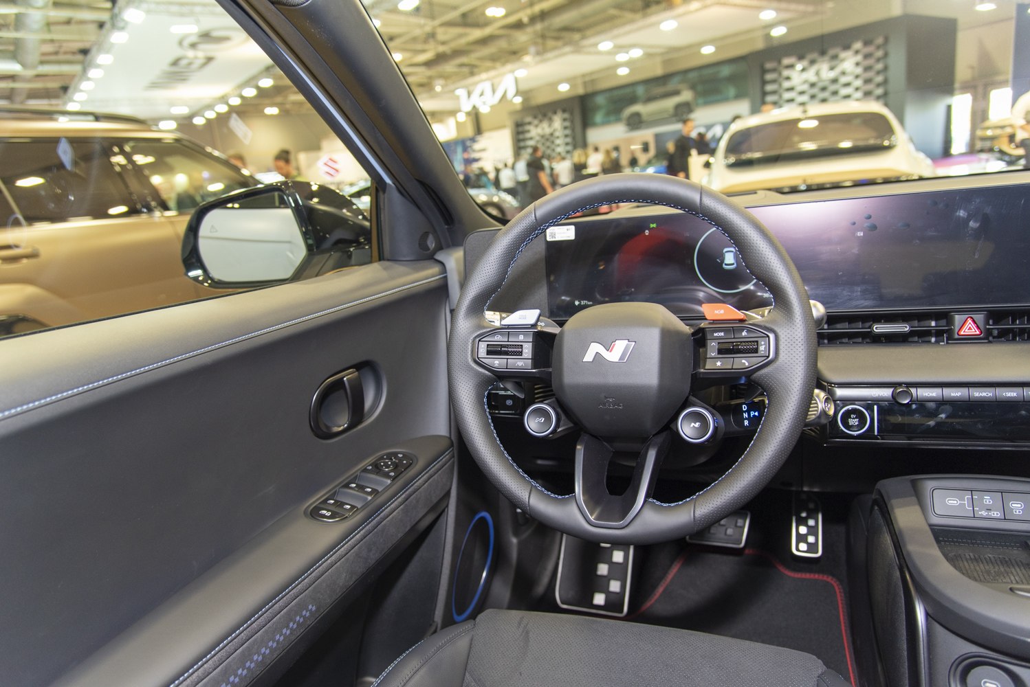 Digital dashboard and sporty steering wheel with controls