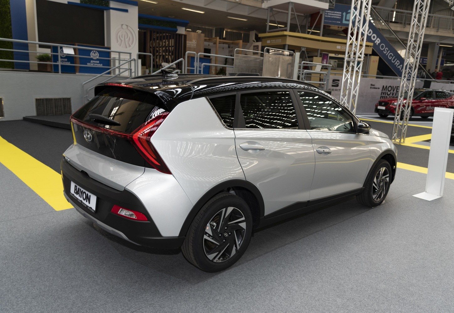 Rear and side view of modern compact crossover with dual-tone paint