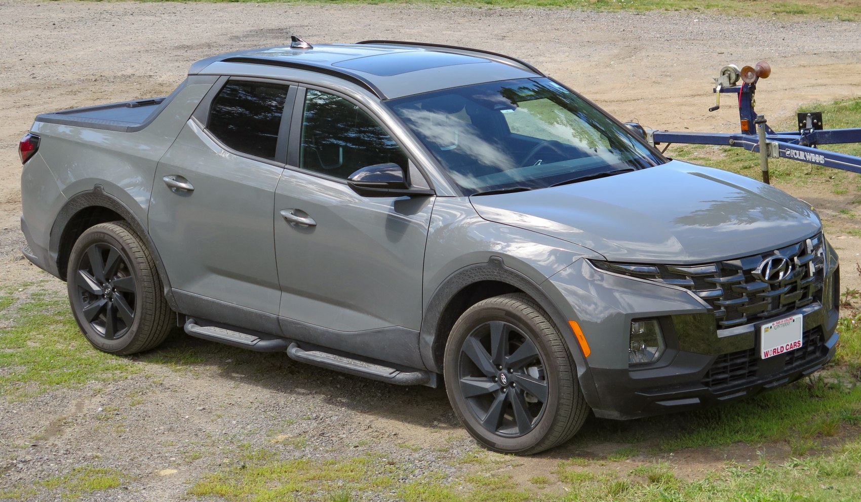 Pickup truck with bold front grille and crew cab design
