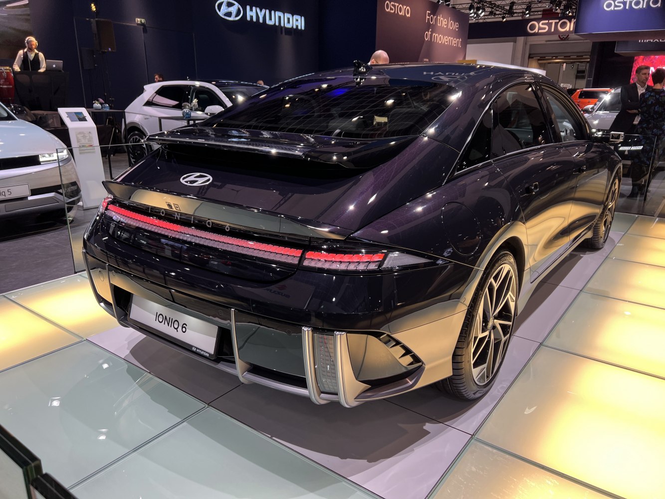 Sleek rear view with LED light strip and aerodynamic spoiler