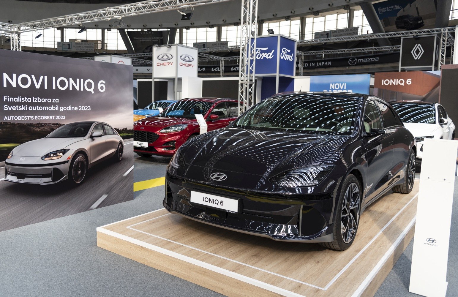 Electric sedan with sleek aerodynamic body and modern LED headlights