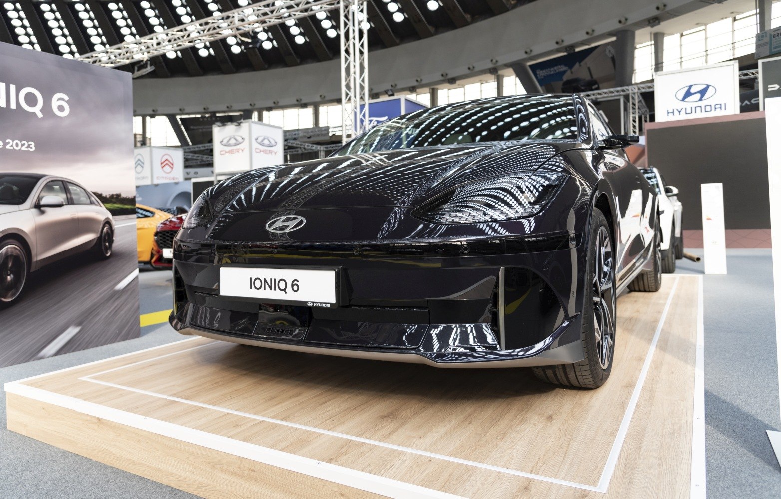 Sleek front view with aerodynamic design and distinct headlights
