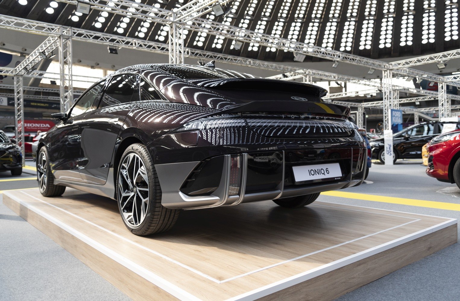 Rear design and alloy wheels of a modern electric sedan