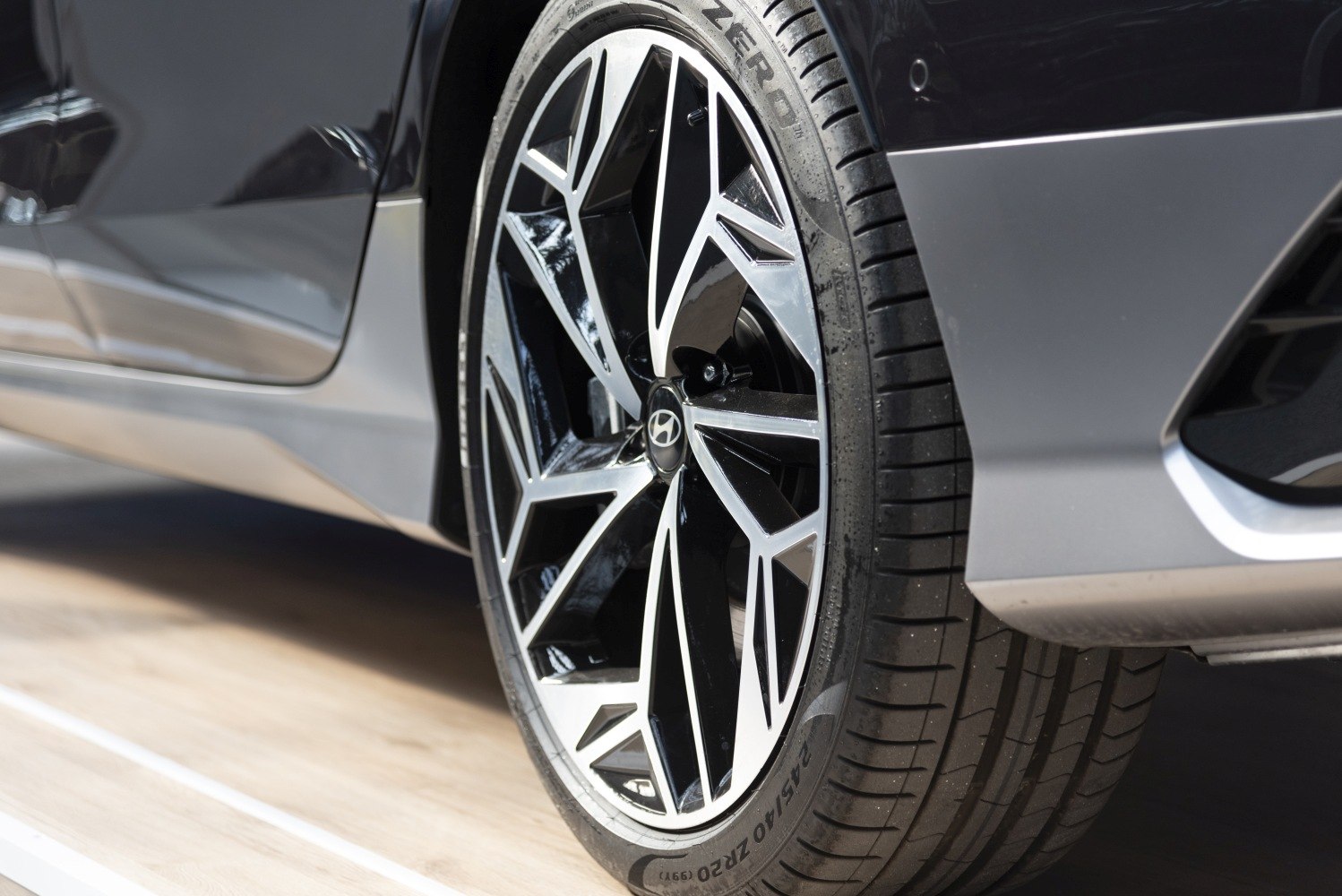 Stylish alloy wheel with Pirelli P Zero tire on modern electric vehicle