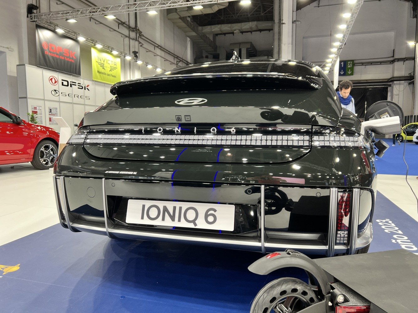 Rear view showing LED taillights and charging port of electric vehicle