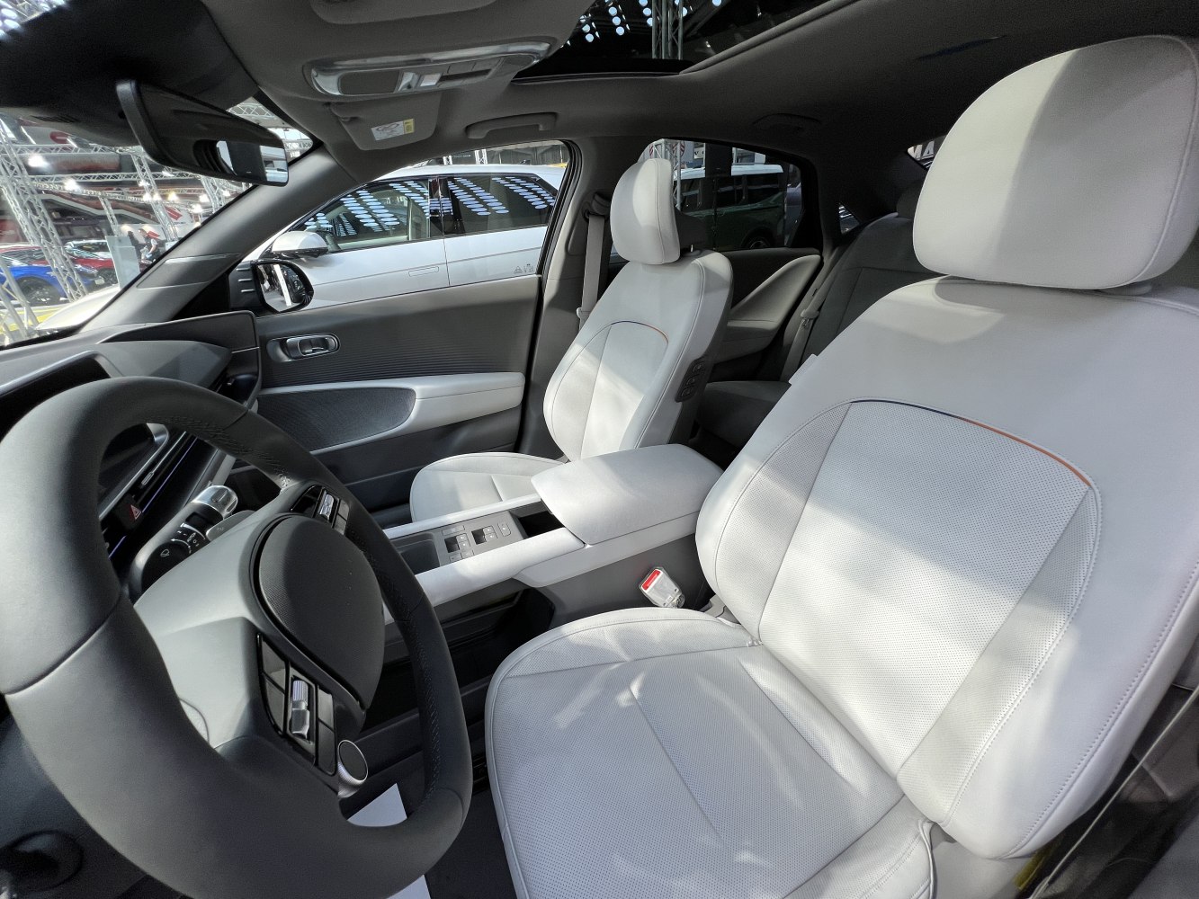 White leather seats and ergonomic driver cockpit interior