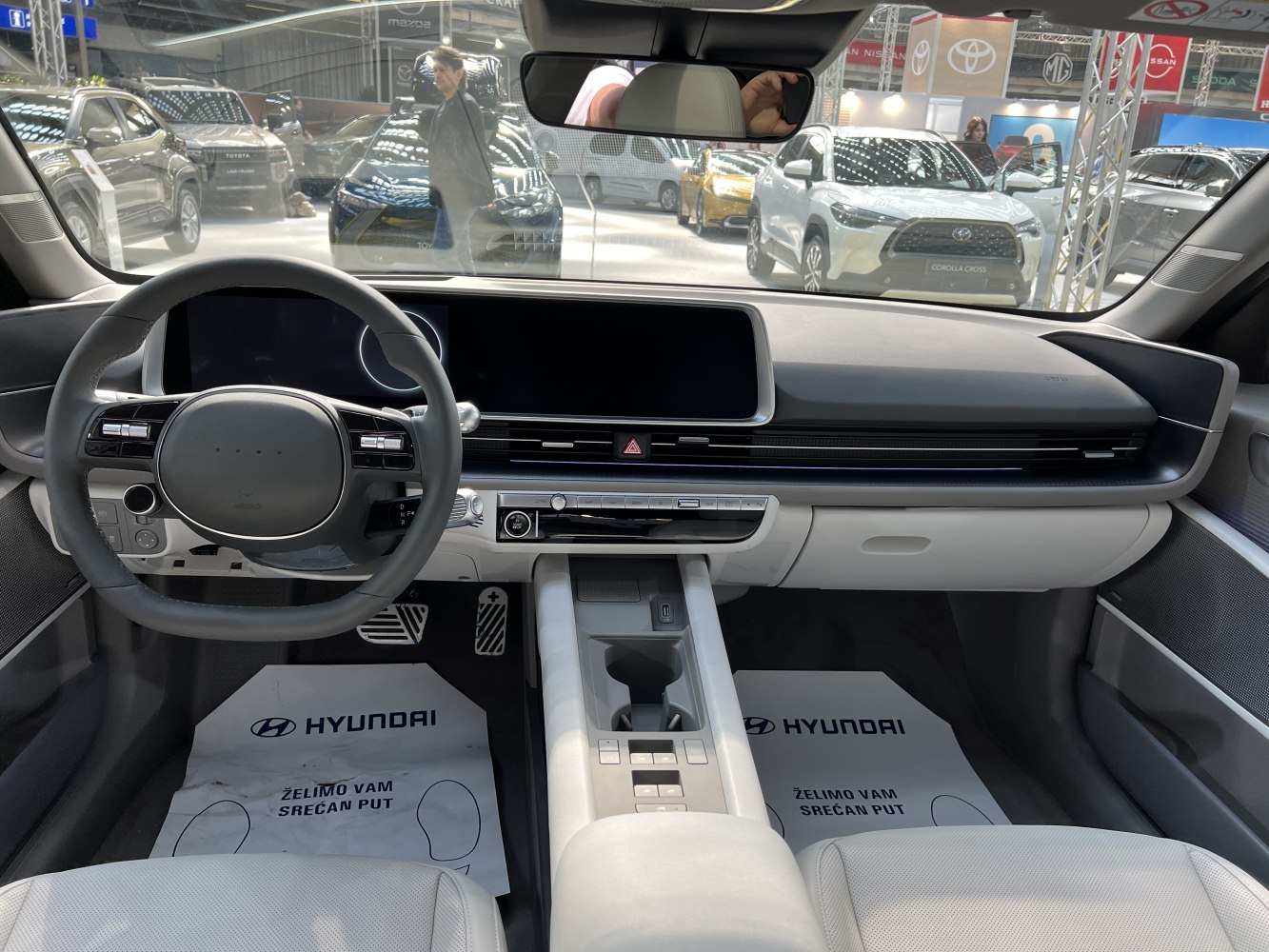 Minimalist digital dashboard and streamlined steering wheel controls