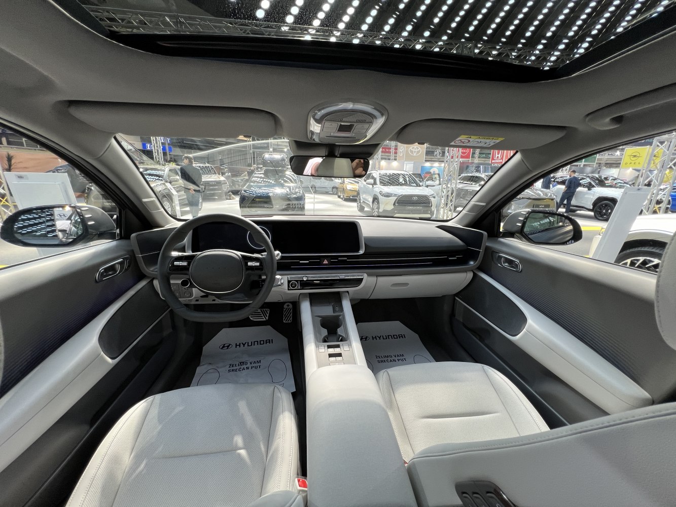 Modern car cockpit with sleek digital dashboard and ergonomic controls