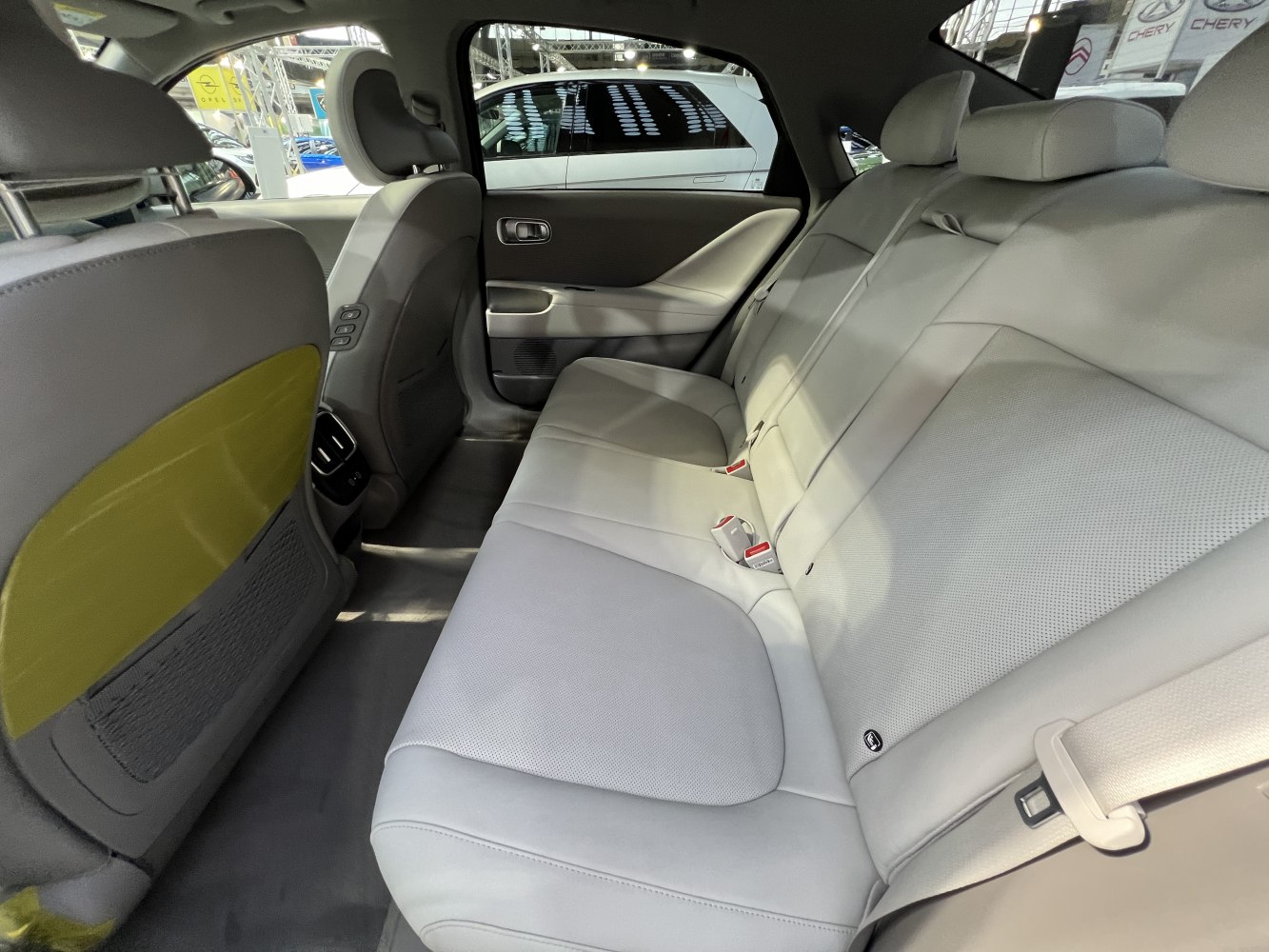 Spacious modern rear car seats with premium upholstery.