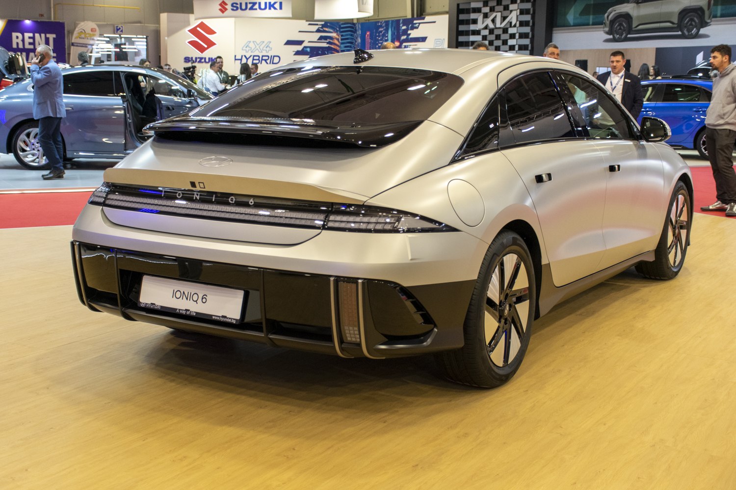 Rear view of electric sedan with sleek aerodynamic design and LED rear lights