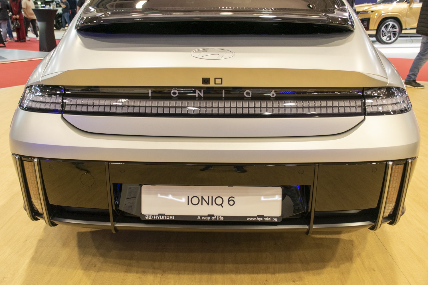 Rear view showcasing integrated LED taillights and smooth aerodynamic design