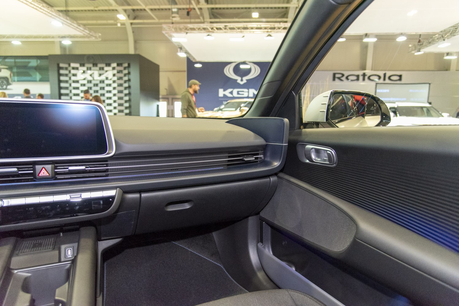 Dashboard and passenger side interior with infotainment screen and door panel