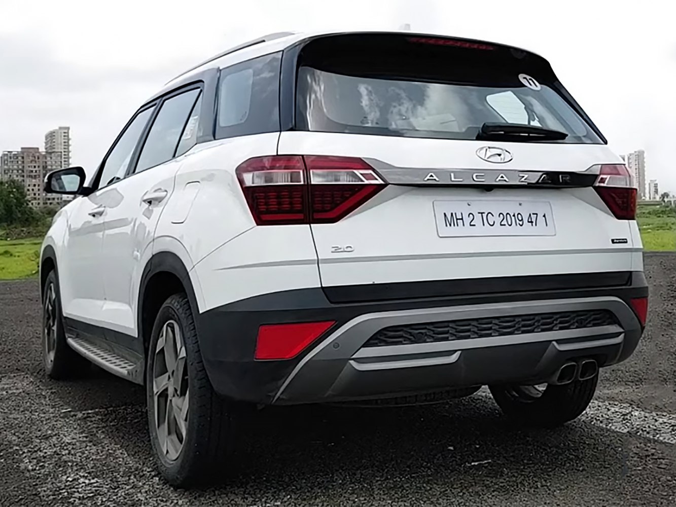 Rear view with dual exhaust and angular tail lamps