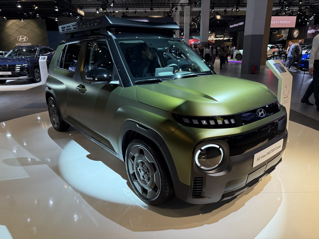 SUV with roof rack, LED strip and circular headlights