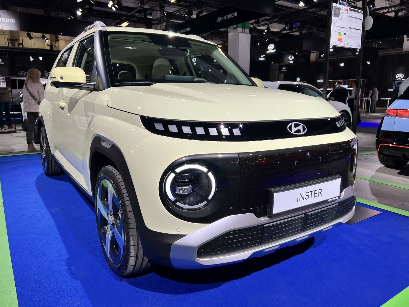 Front view of compact SUV with circular LED headlights and upper LED daytime running lights