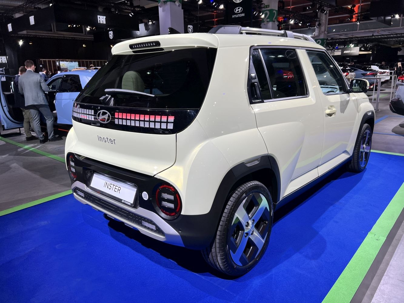 Rear and side view with pixel-style LED tail lights and compact SUV design