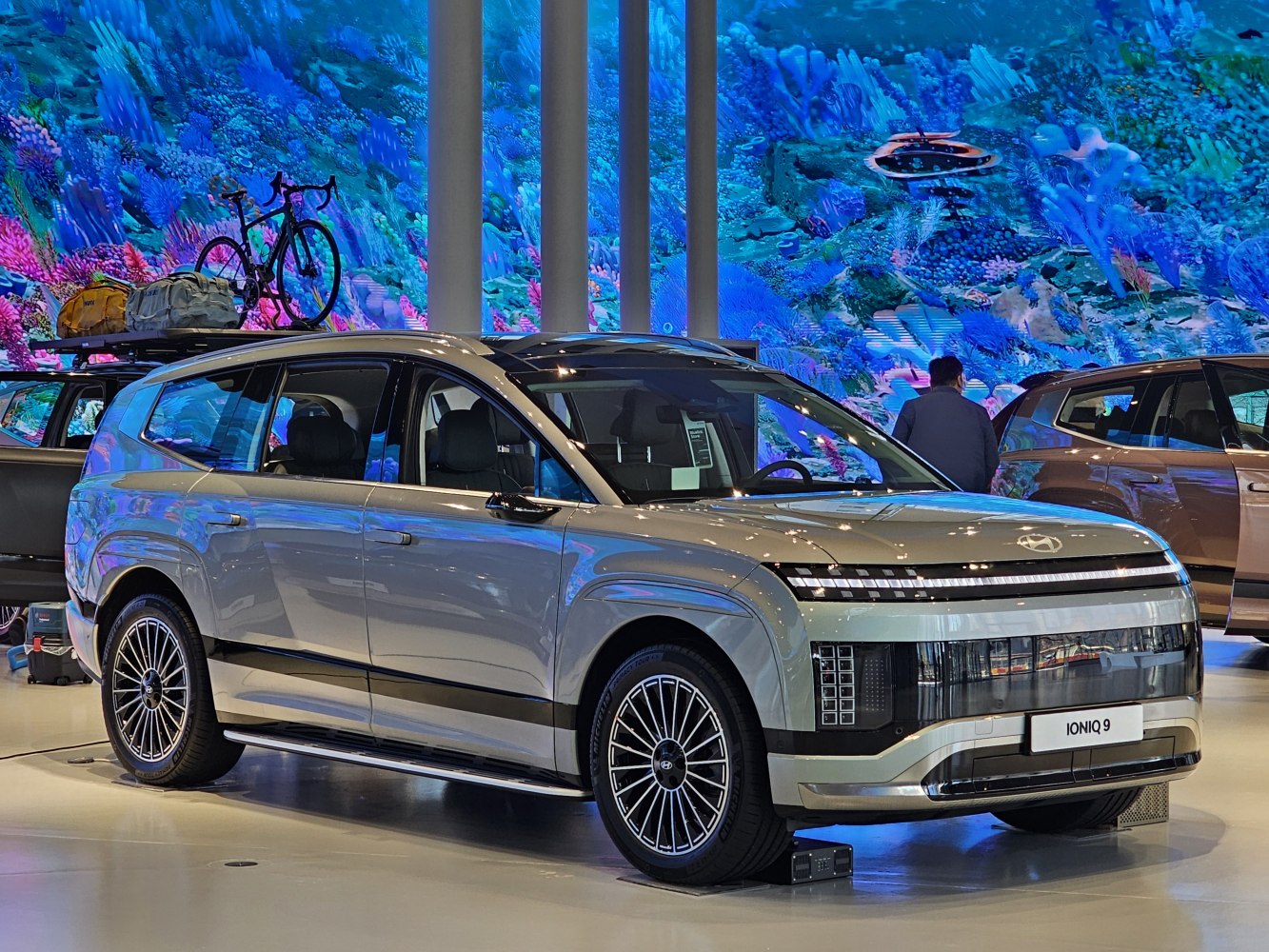 Large SUV with futuristic vertical LED front lights and sleek design