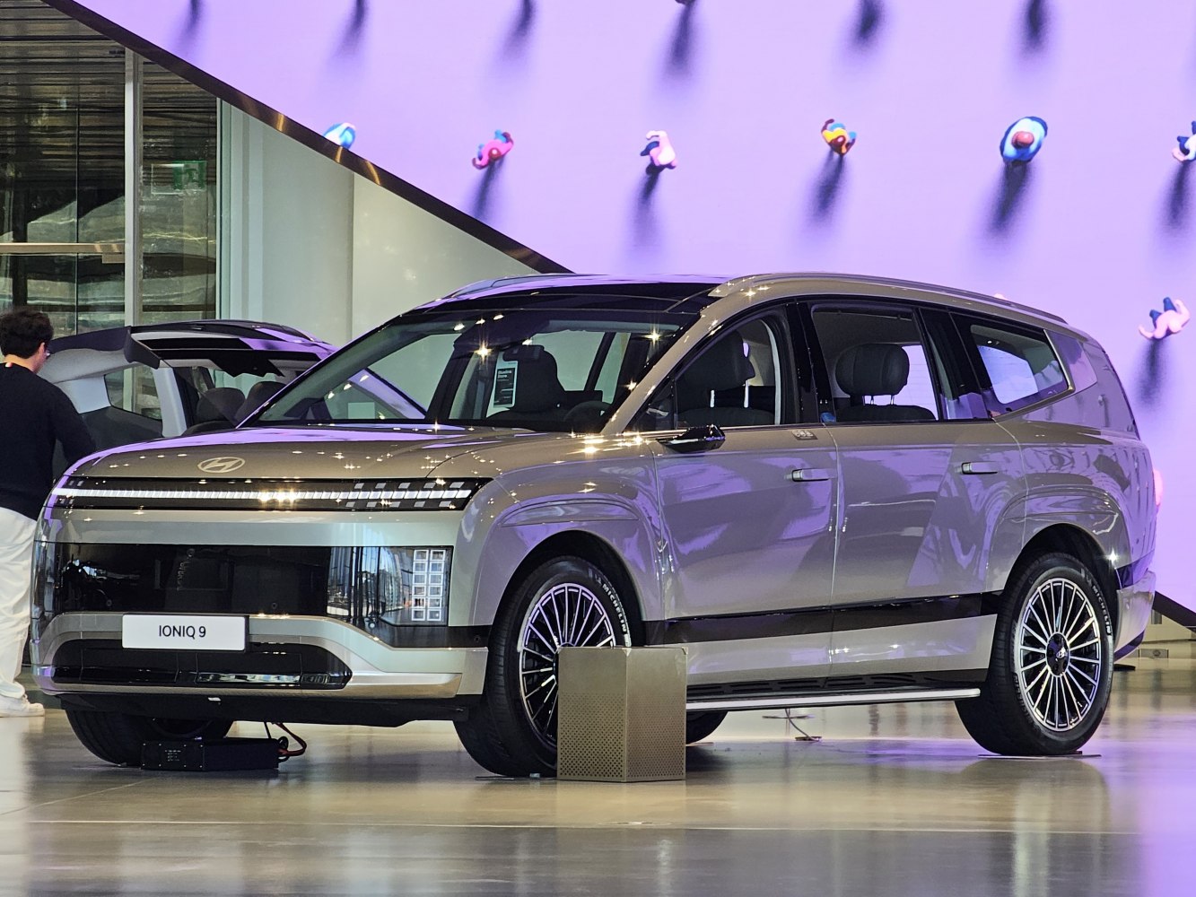Front and side view of electric SUV with LED headlights and alloy wheels