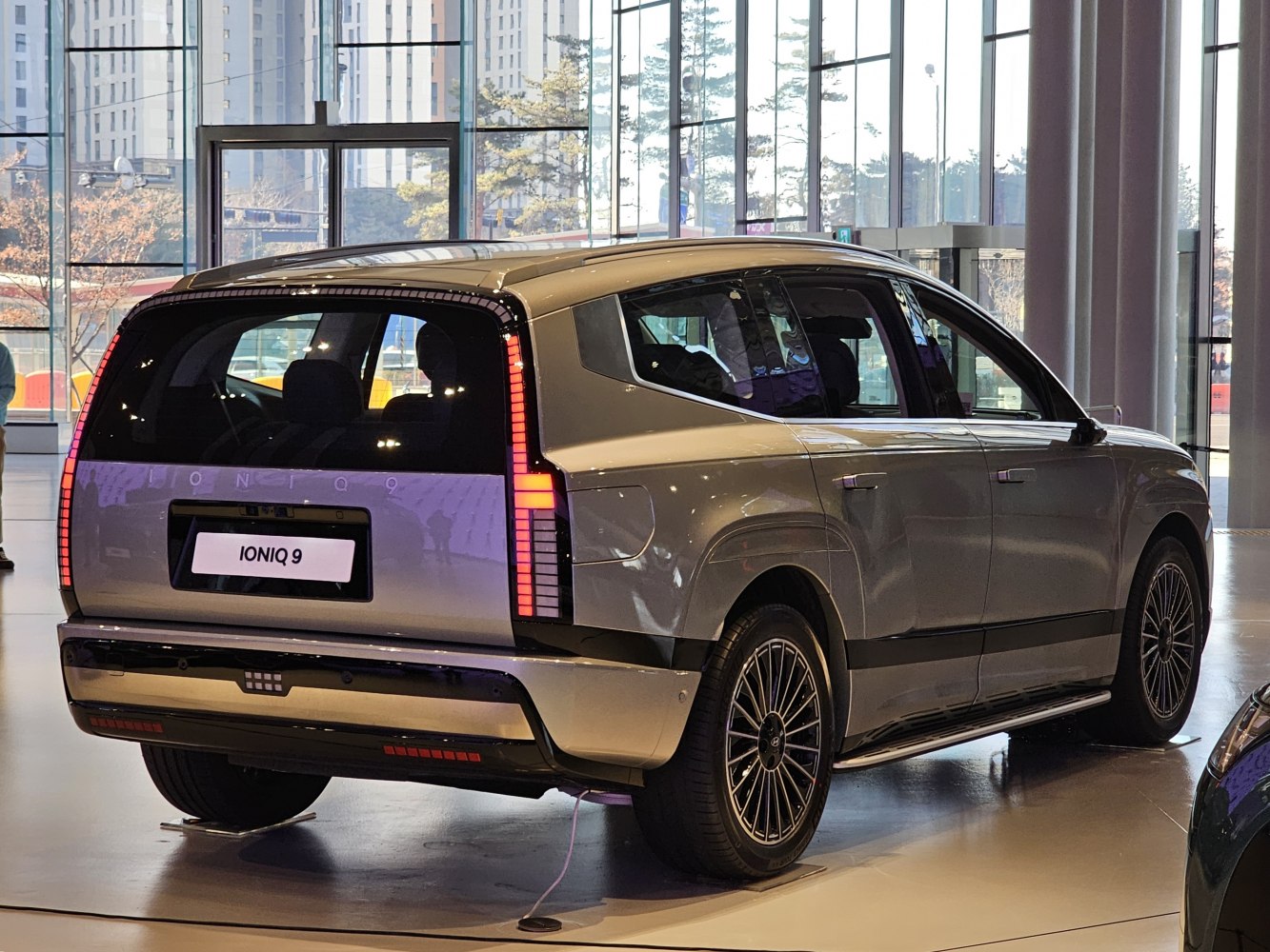Rear view with vertical LED tail lights and futuristic rear design