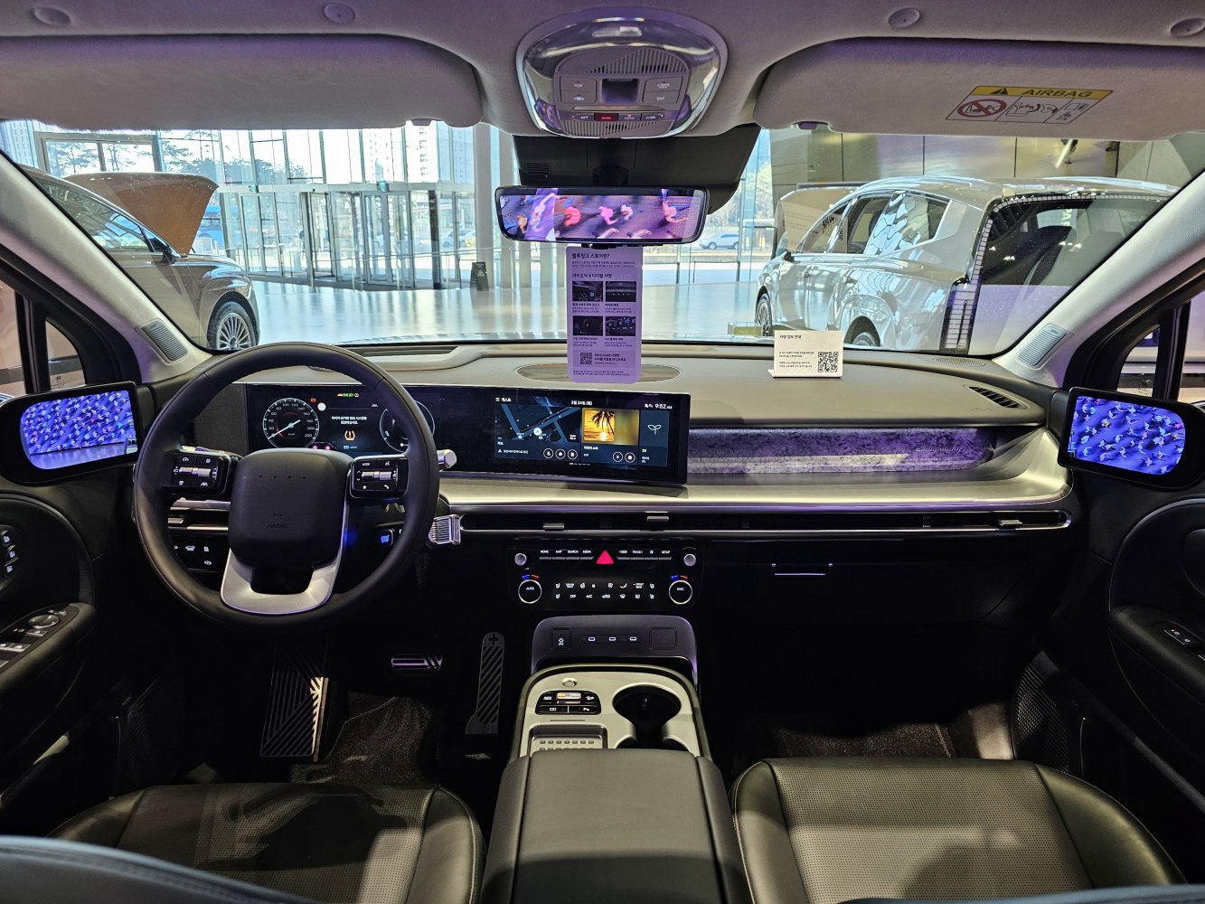 Digital instrument cluster, infotainment screen, and digital side mirrors
