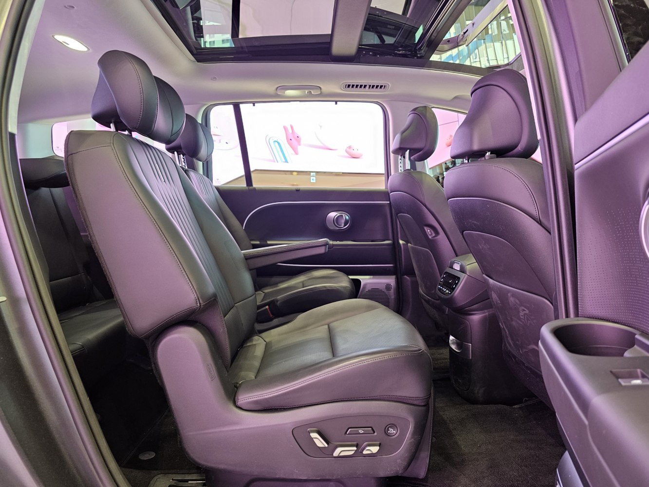 Second-row captain seats and panoramic sunroof in spacious rear cabin