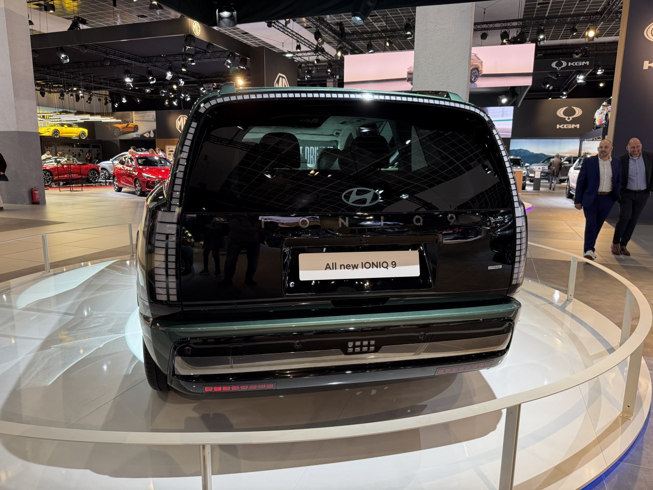 Rear view of futuristic full-electric SUV with LED tail lights