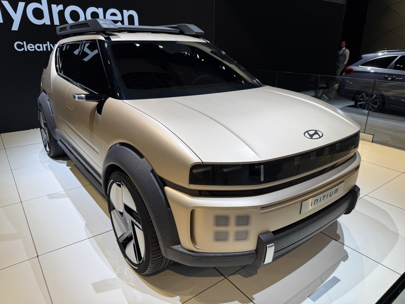 Futuristic SUV front with unique LED lights and roof rack