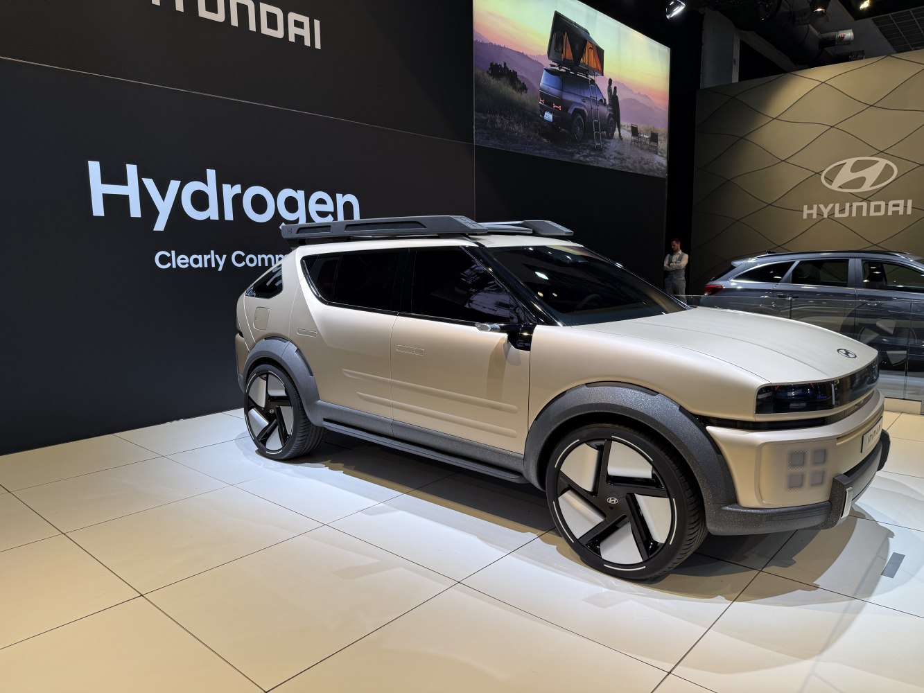 Futuristic SUV with distinctive LED lighting and large black alloy wheels