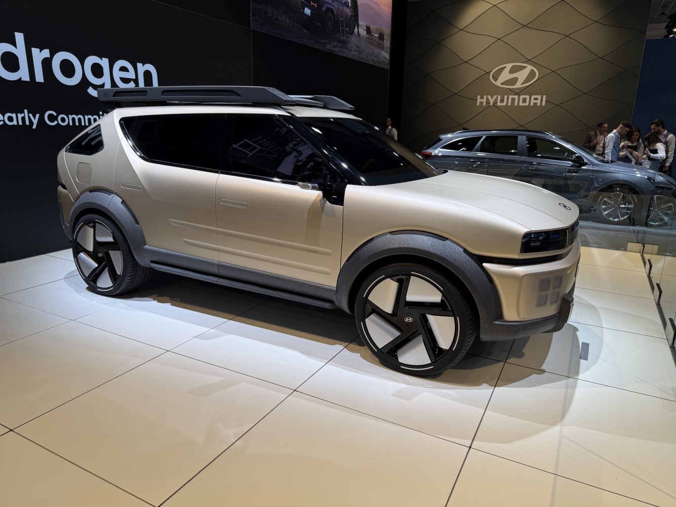 Futuristic SUV with angular body and large stylized wheels