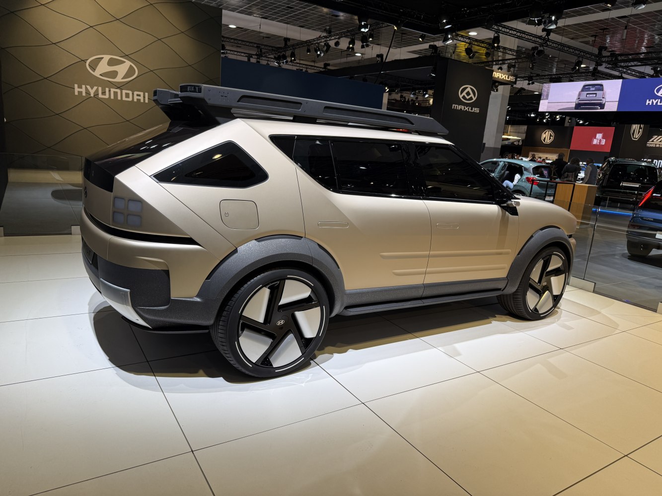 Futuristic electric SUV side profile with angular rear and bold wheels