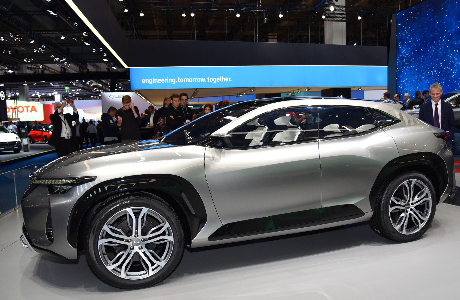 Sleek side profile and futuristic design of a sporty SUV coupe.