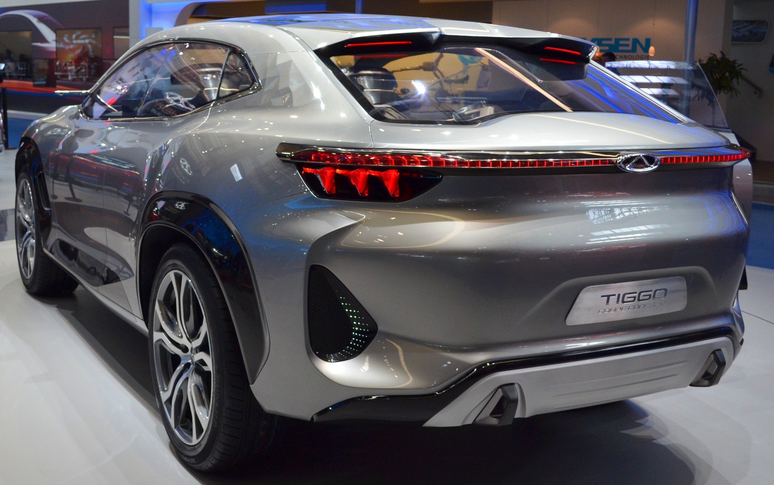 Futuristic rear design with sleek LED tail lights and sporty coupe styling