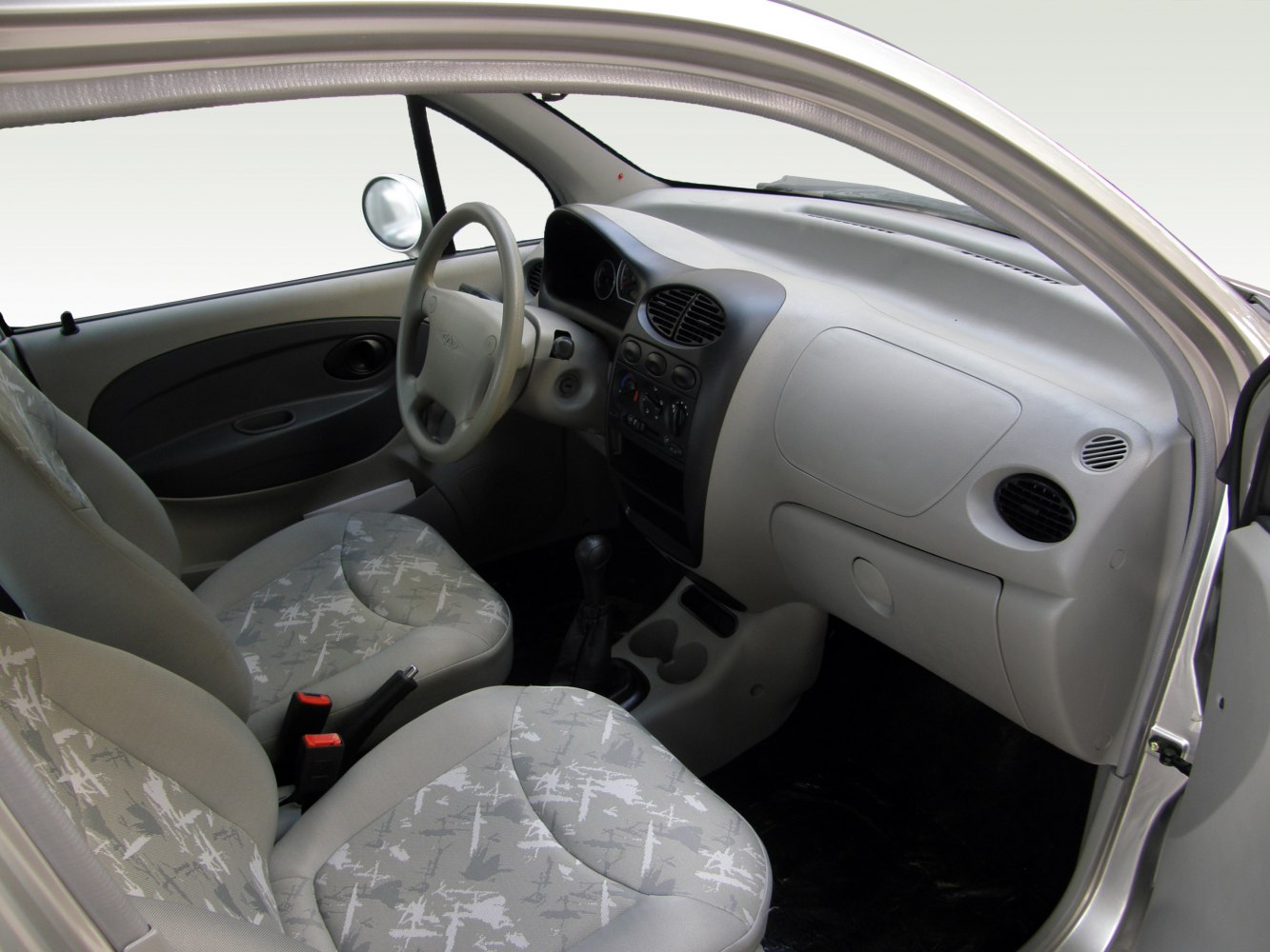 Interior view of car dashboard and front seats