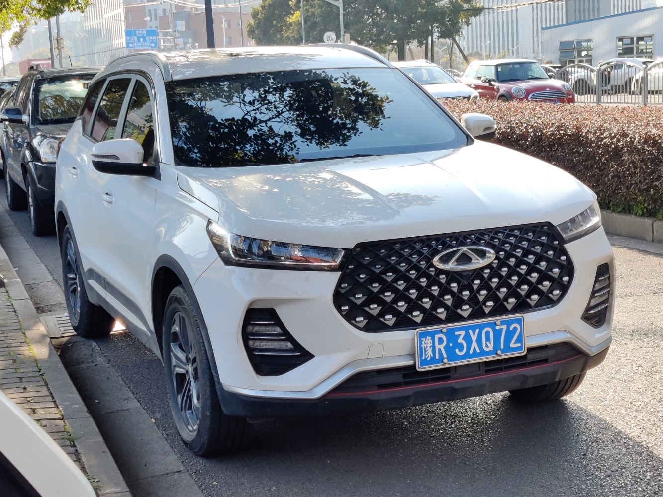 Front view of 2020 SUV with diamond mesh grille and LED headlights
