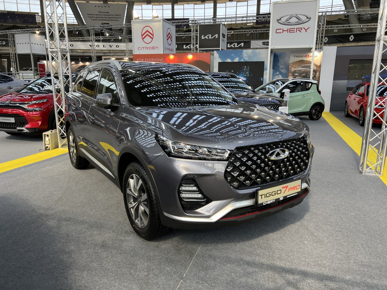 SUV front view with diamond-pattern grille and LED headlights