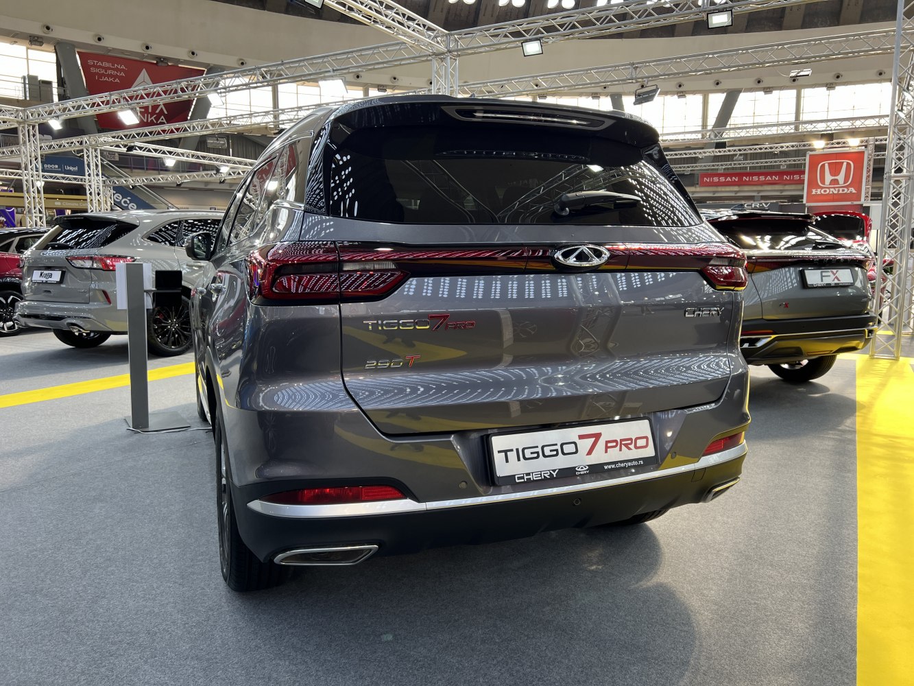 Rear view with modern taillights and dual exhausts on SUV