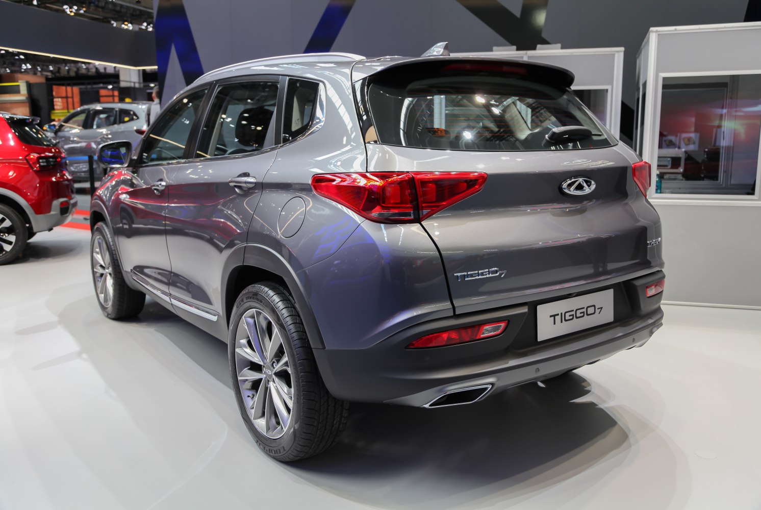 Rear exterior view with tail lights and alloy wheels