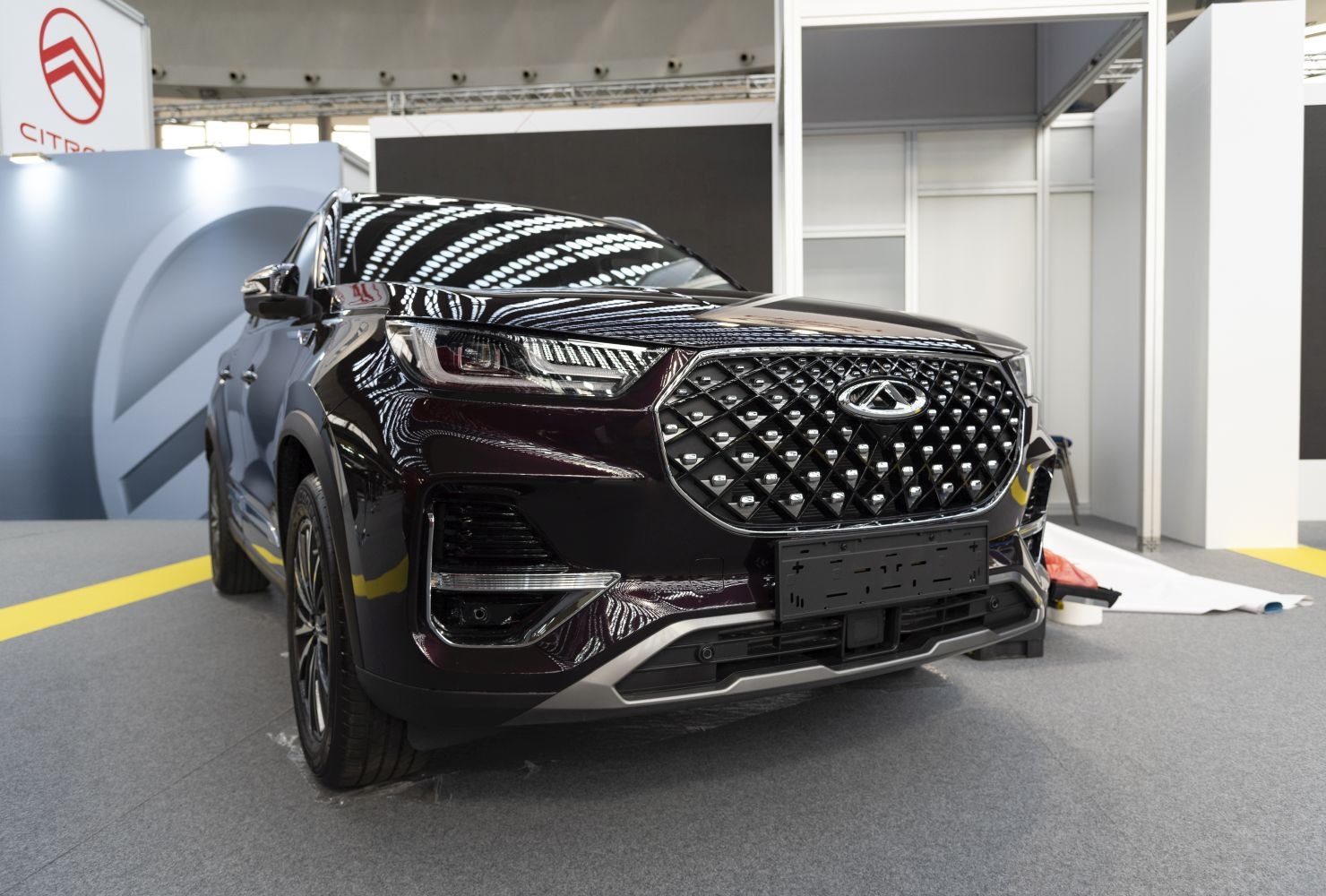 Front grille and LED headlights design of a luxury SUV.