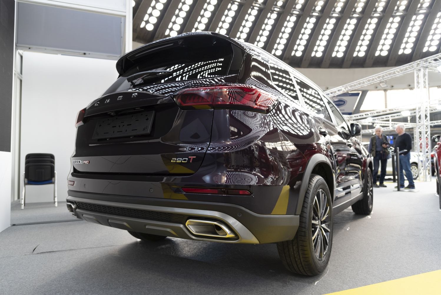 High-angle rear perspective featuring LED taillights and dual exhaust outlets.