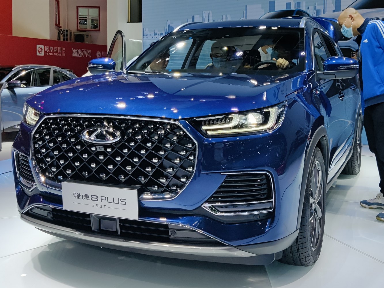 Close-up of front grille and LED headlights