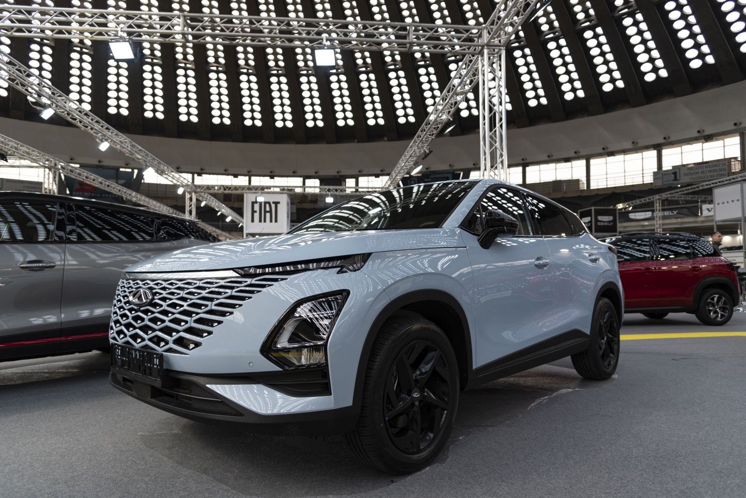 Modern SUV front with distinctive rhinestone grille and black alloy wheels