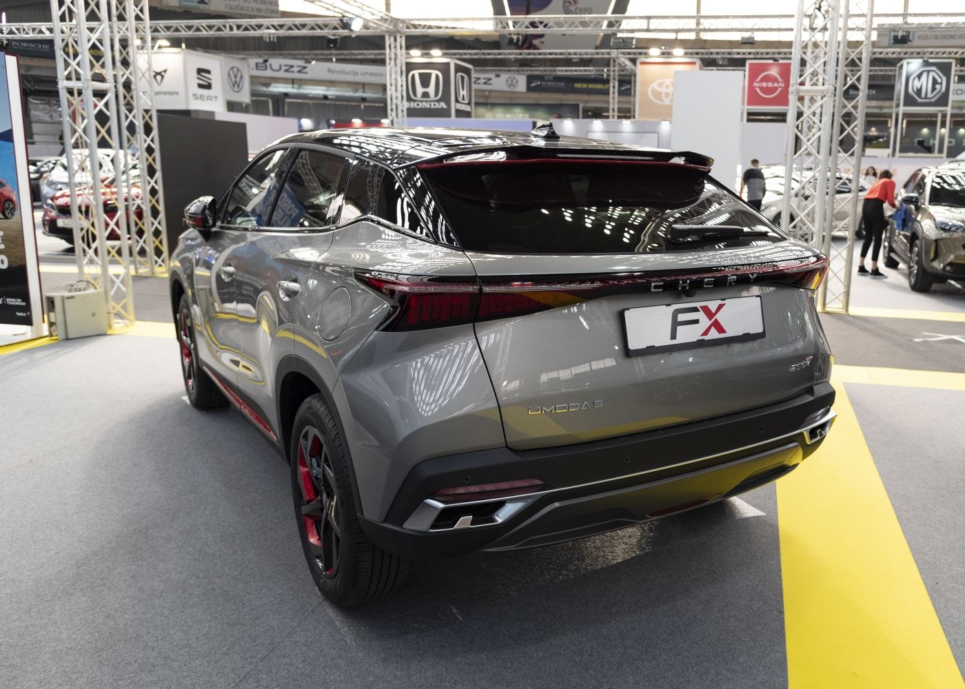 Rear design with sleek tail lights and sporty red-black rims
