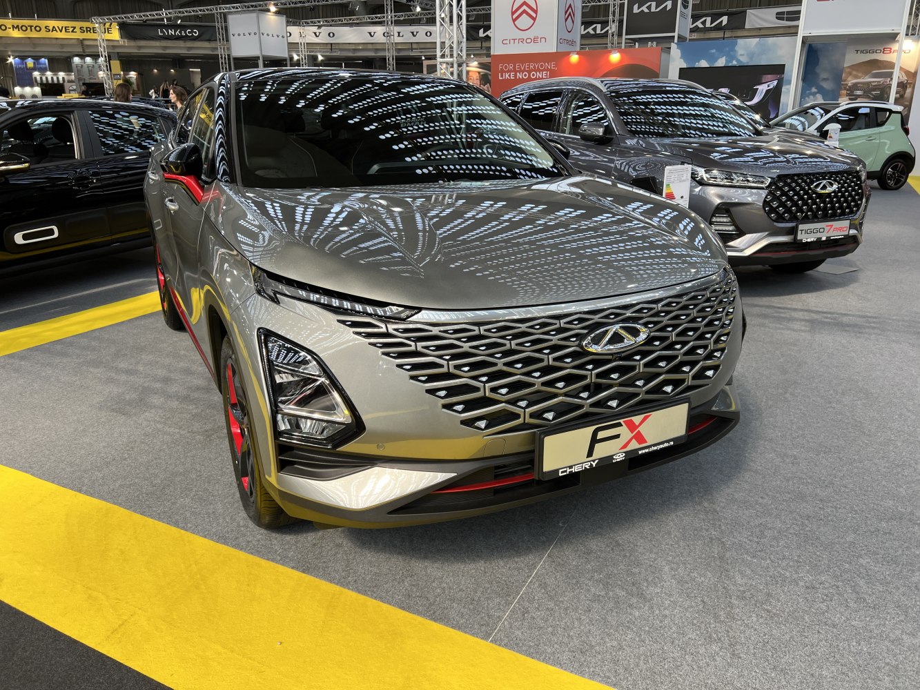 Front grille and headlight design of an SUV at an auto show