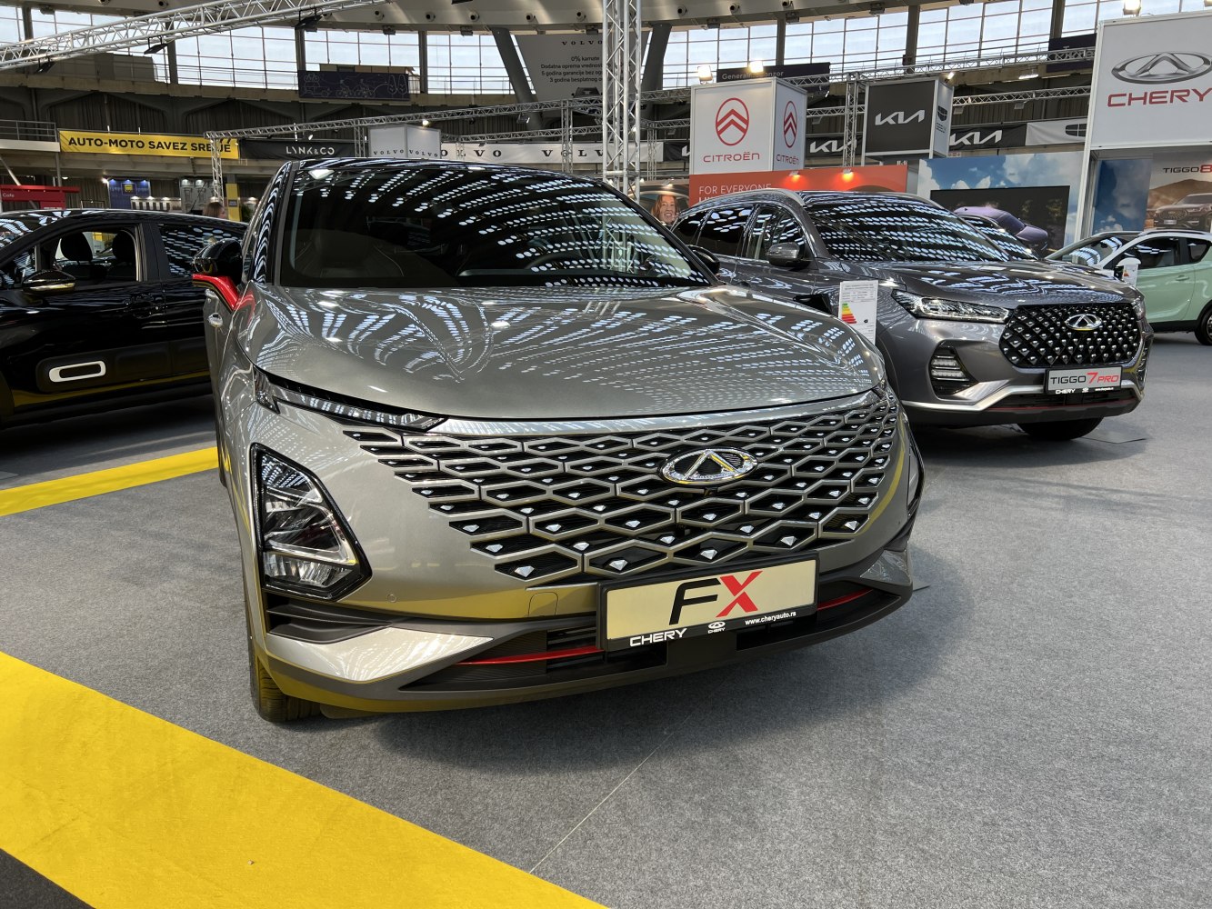Front view showcasing the distinct grille and headlights design of the vehicle.