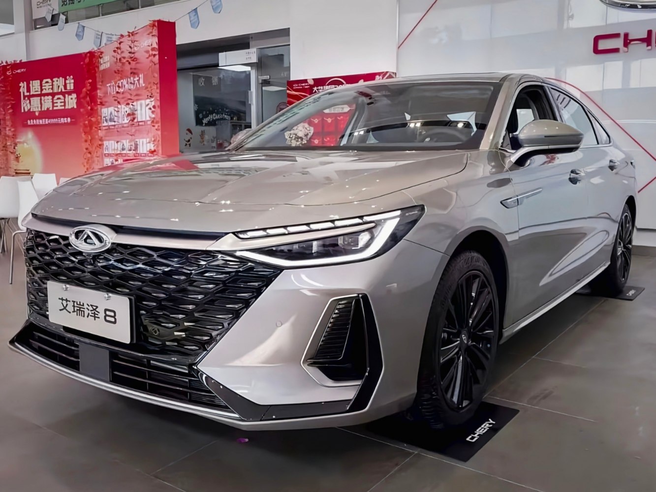 Large stylish front grille with sharp LED headlights on a modern sedan.