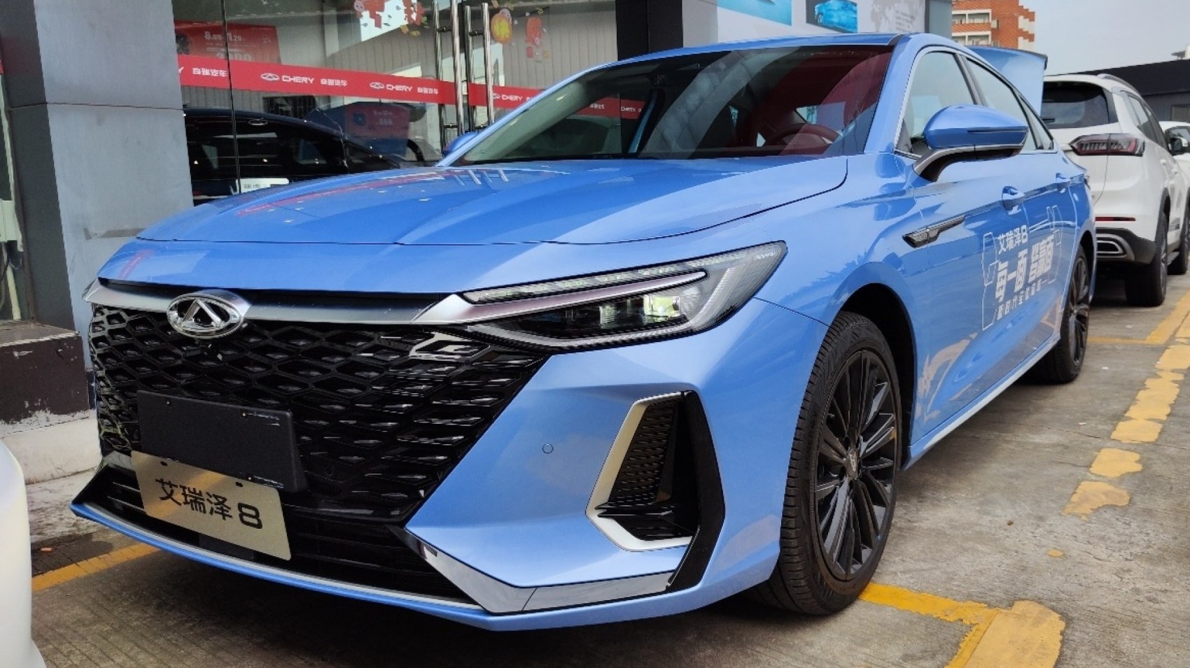 Front view with bold grille and LED headlights