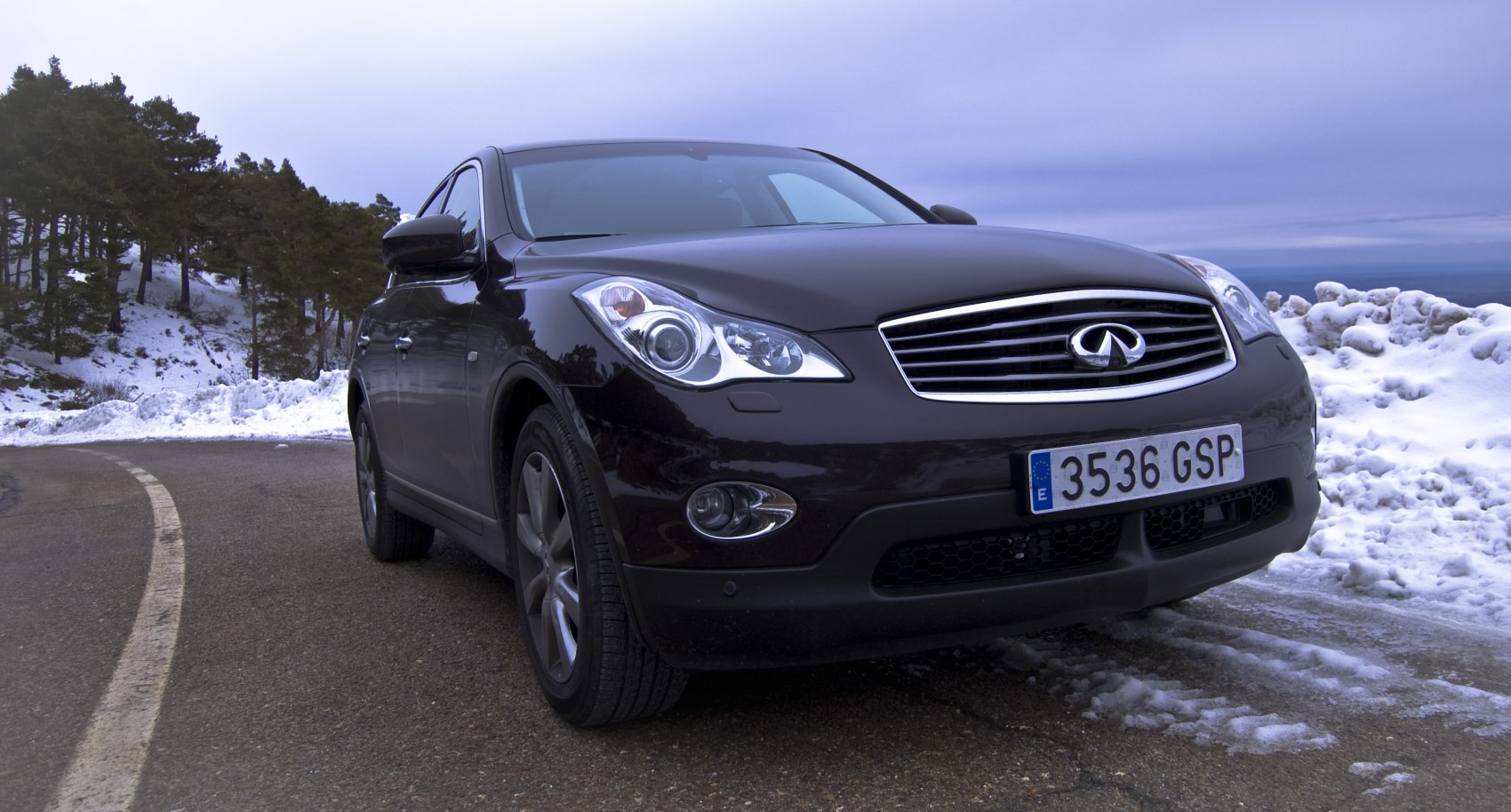 Close-up front view with chrome grille and prominent headlights