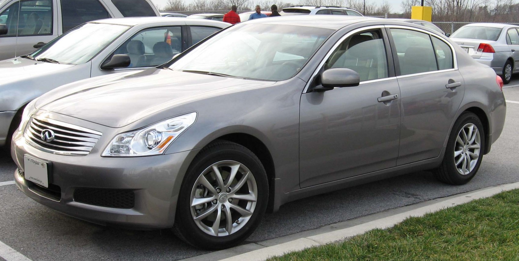 Sedan with modern alloy wheels and integrated headlight design